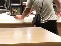 Dude caught sticking dick in his female partner's butt at quick food store