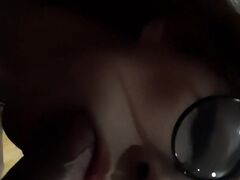 Dazzling woman with glasses takes a fast facial cumshot